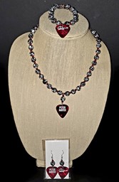 Show details for Black and White Marbled Peter Mayer Guitar Pick Necklace Picture of Black and White Marbled Peter Mayer Guitar Pick Necklace