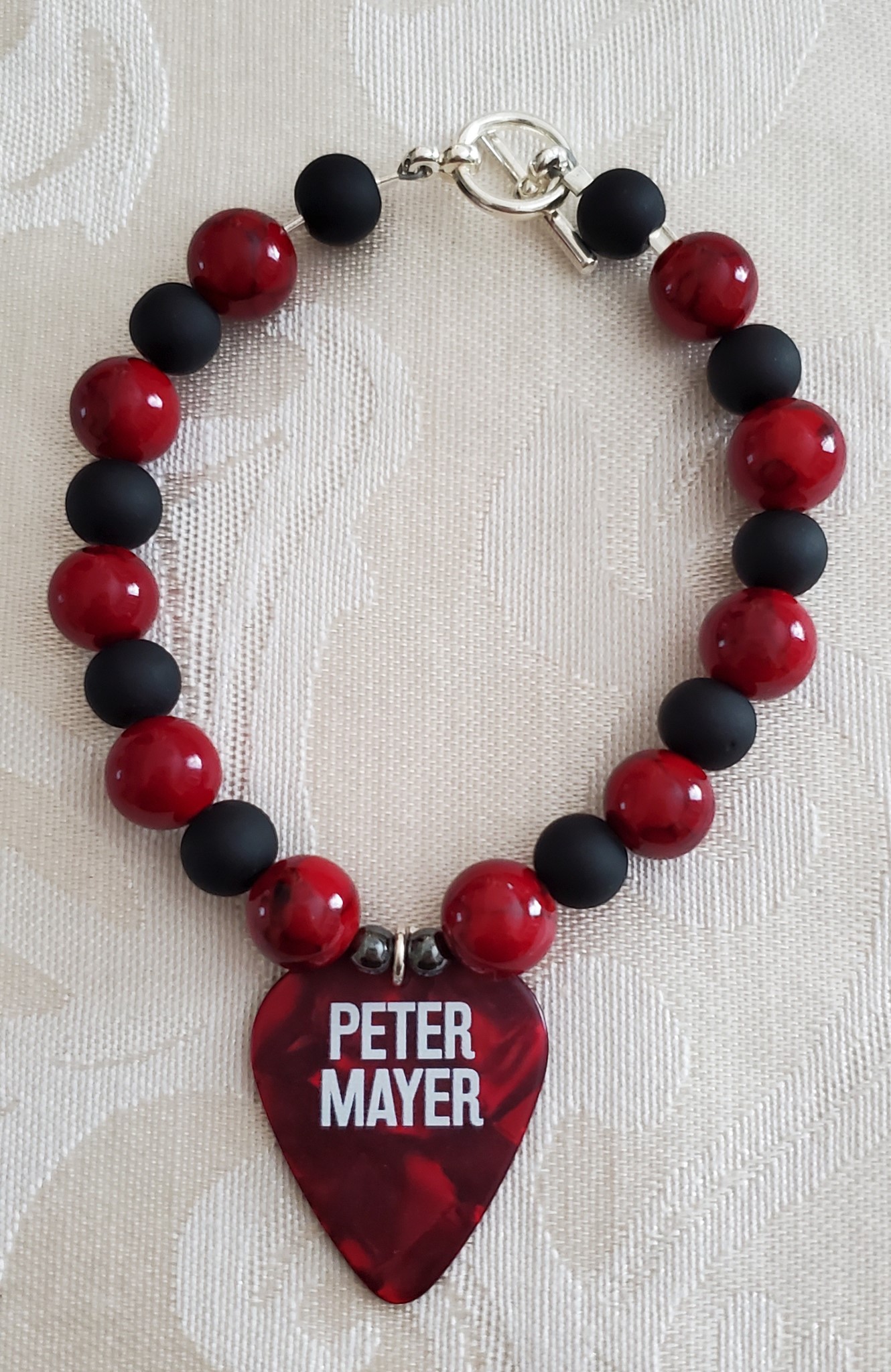 Picture of Red and Black Peter Mayer Guitar Pick Bracelet