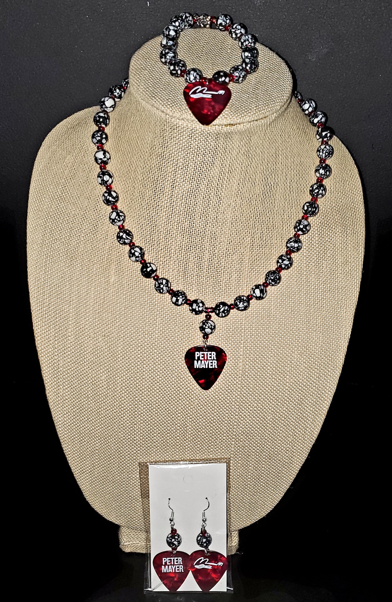 Picture of Black and White Marbled Peter Mayer Guitar Pick Necklace